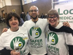 Several Safer Homes volunteers at the Washington Arms Collectors Puyallup Gun Show. Photo courtesy David Yamashita.